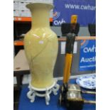 A large cream and blue patterned Oriental pattery vase 90cm on wooden stand,