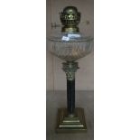 A brass Corinthian column oil lamp