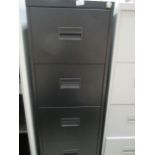 A black metal four drawer filing cabinet (unlocked no keys)