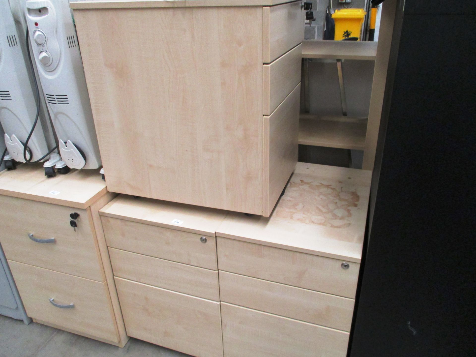 Three pine finish two drawer pedestals (one with key)