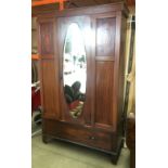 An Edwardian inlaid mahogany mirror door wardrobe 116cm