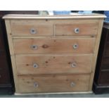 A pine chest of drawers [2 short, 3 long] 105 cm high,
