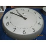 A TR Services electric wall clock 28cm diameter