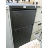 A black metal four drawer filing cabinet (unlocked no keys)