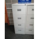 A grey metal four drawer filing cabinet (unlocked no key)