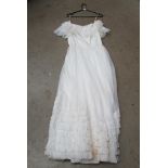 A vintage white wedding dress by Berkertex Bride complete with a Jenny Lynne tiara