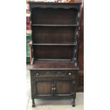 Small oak cupboard with a single drawer and cupboard below t/w associated dresser top