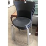 4 x black plastic stacking chairs on chrome metal legs