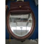 Two items - oak framed oval mirror and a Must de Cartier Paris brown leather satchel
