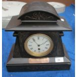A Victorian black marble mantel clock