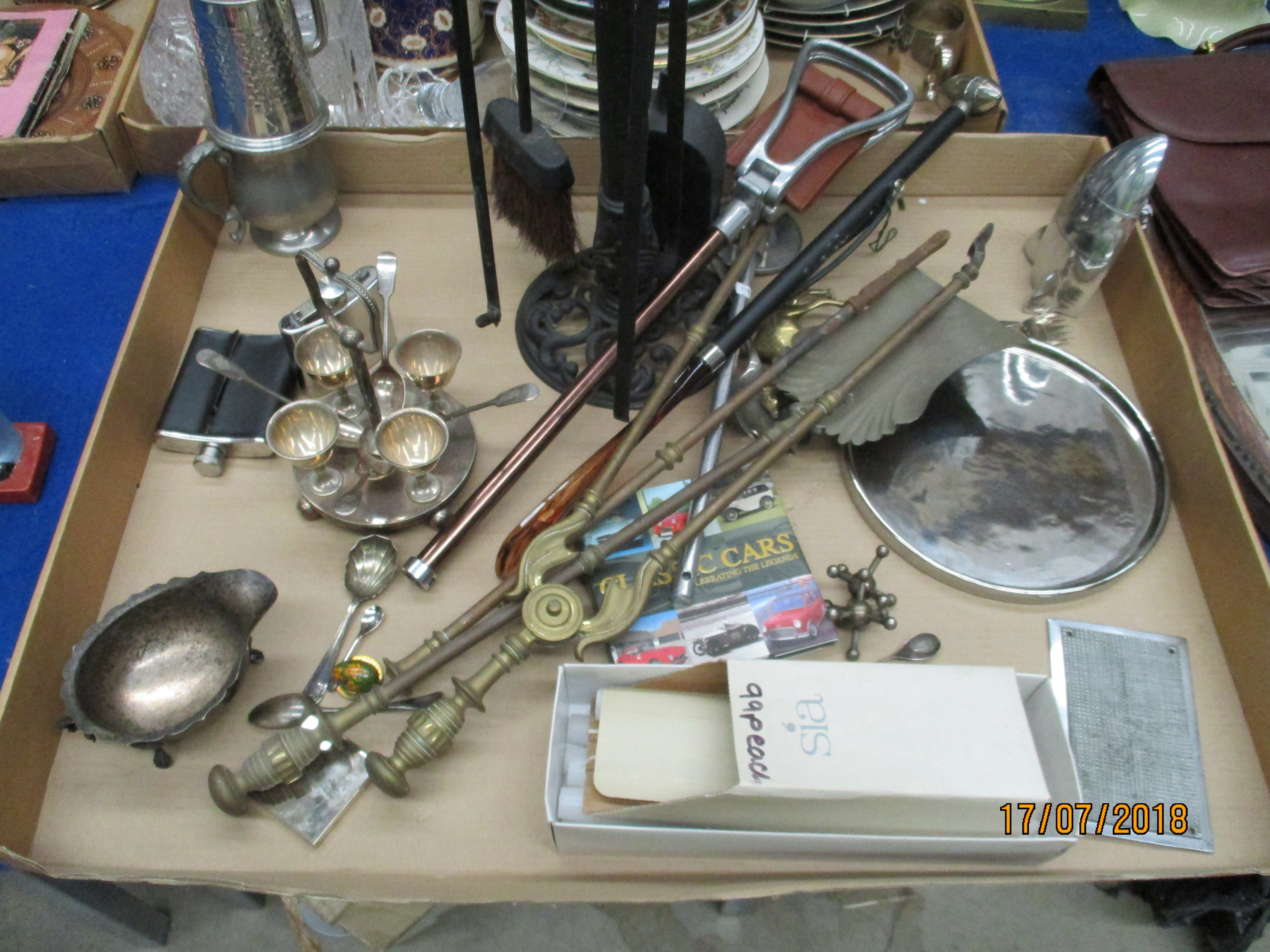 Contents to tray - metal fire irons, silver plated jug, metal pewters, candles,