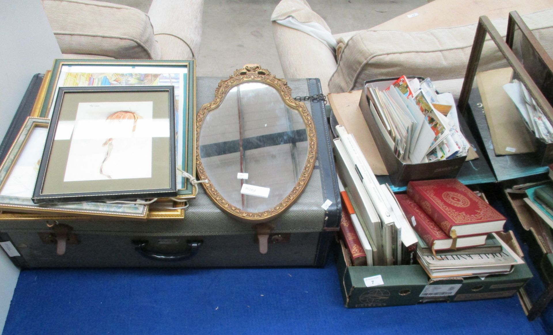 Large quantity of postcards, framed wall mirrors, framed oils of fruit, vintage suitcase, books,