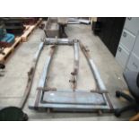 Two wood and metal horse-drawn cart shafts each approx 8' long