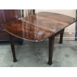 An oak gate leg dining table 105 cm x 148 cm extended