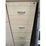 A pine finish four drawer office filing cabinet (unlocked no keys)