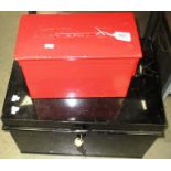 Black metal deed box with key and a red painted metal ammunition box