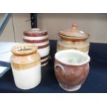 Three earthenware jars and a barrel