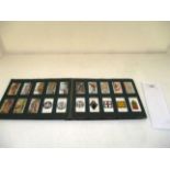 A Wills cigarette card album including cards by Gallagher, Wills including roses, military, flowers,