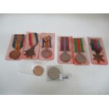 Three World War I medals, three World War II medals,