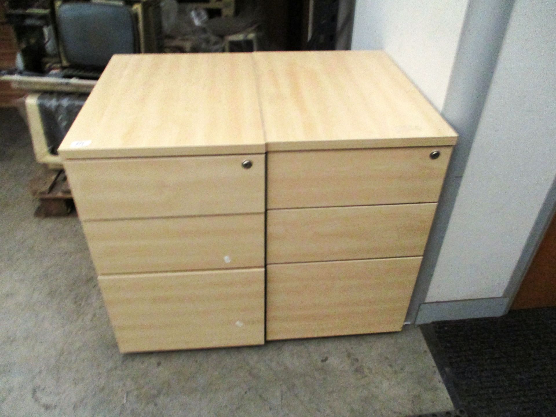 Two pine finish three drawer pedestal (unlocked no keys)