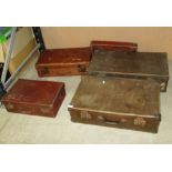 Four vintage suitcases,