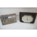 Two items - a metal cigarette box with top inset with a hunting scene and a wall barometer in a