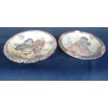 A pair of Japanese satsuma style circular pottery wall plates,