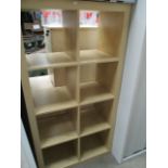 A light pine finish 8 section bookcase