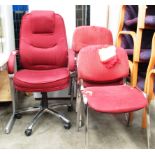 A dark pink cloth upholstered office swivel arm chair on swivel chrome base (please note damage to