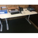 White framed adjustable office desk