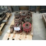 Contents to pallet eight metal and wooden wheel hubs as viewed