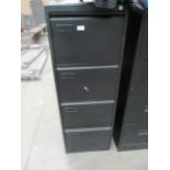 A black metal four drawer filing cabinet (unlocked no key)