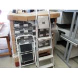 Two items - pair of Abru aluminum step ladders and white painted metal two step stepladder