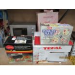 Contents to corner of rack - Matsui microwave oven, Eke kitchen scales, Sunbeam toaster,