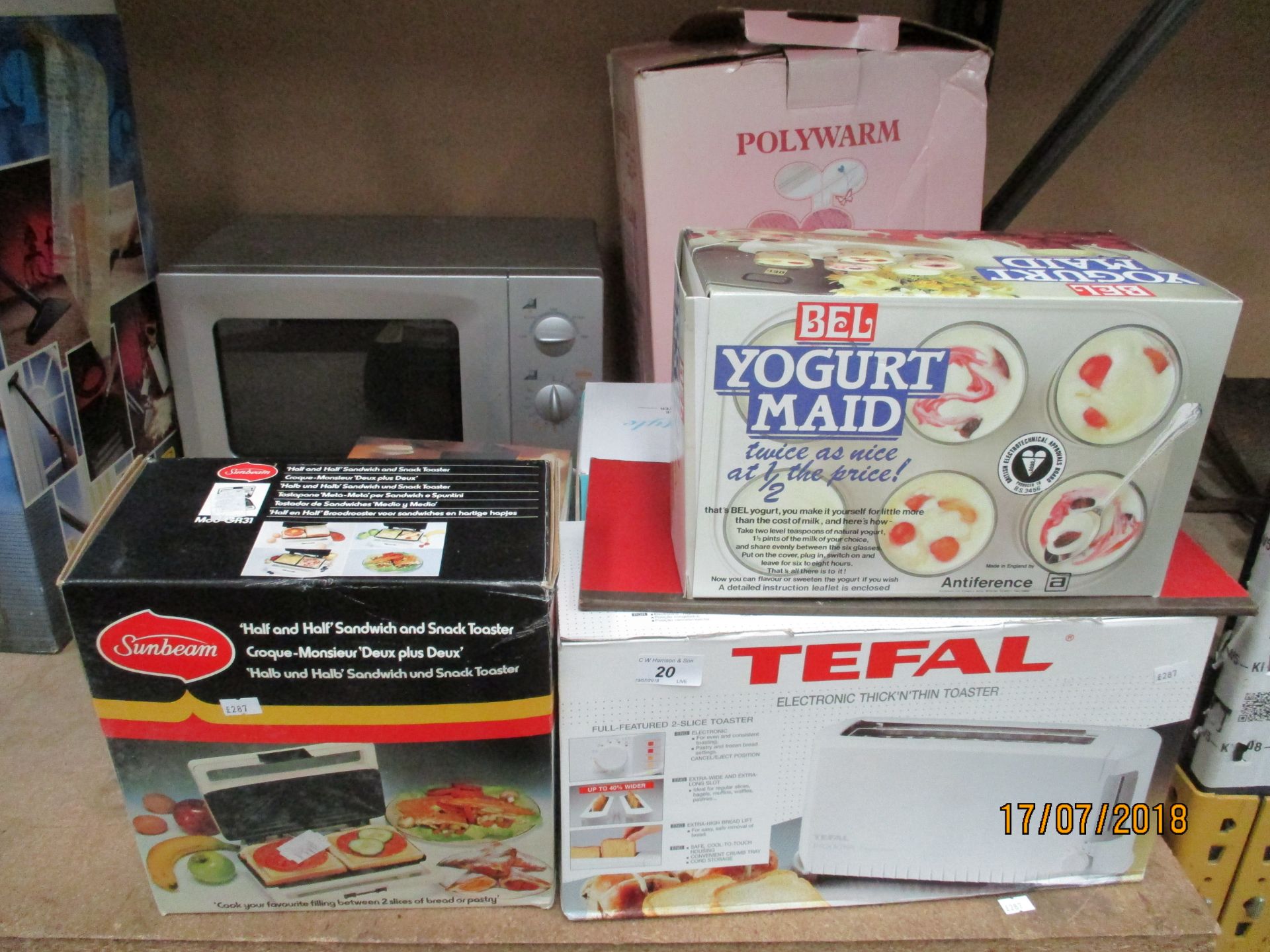 Contents to corner of rack - Matsui microwave oven, Eke kitchen scales, Sunbeam toaster,