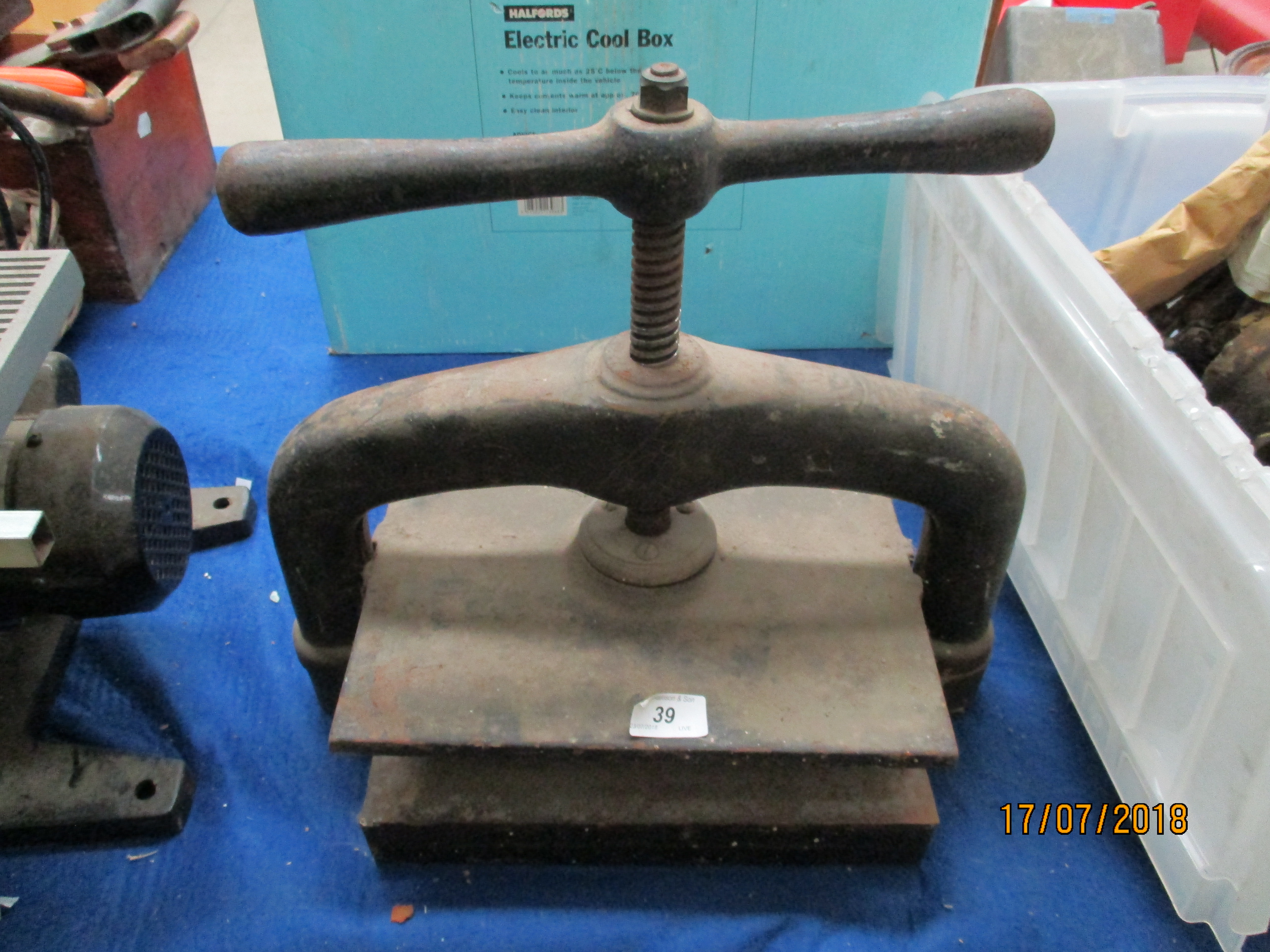 A metal fly book press