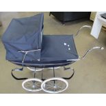 A Silver Cross vintage style pushchair set in navy upholstery inlay