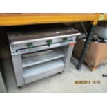 A Falcon Chieftain stainless steel three hot plate electric boiling table on mobile base 3 phase
