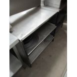 A stainless steel three shelf preparation table 60 x 90cm complete with a quantity of baking trays