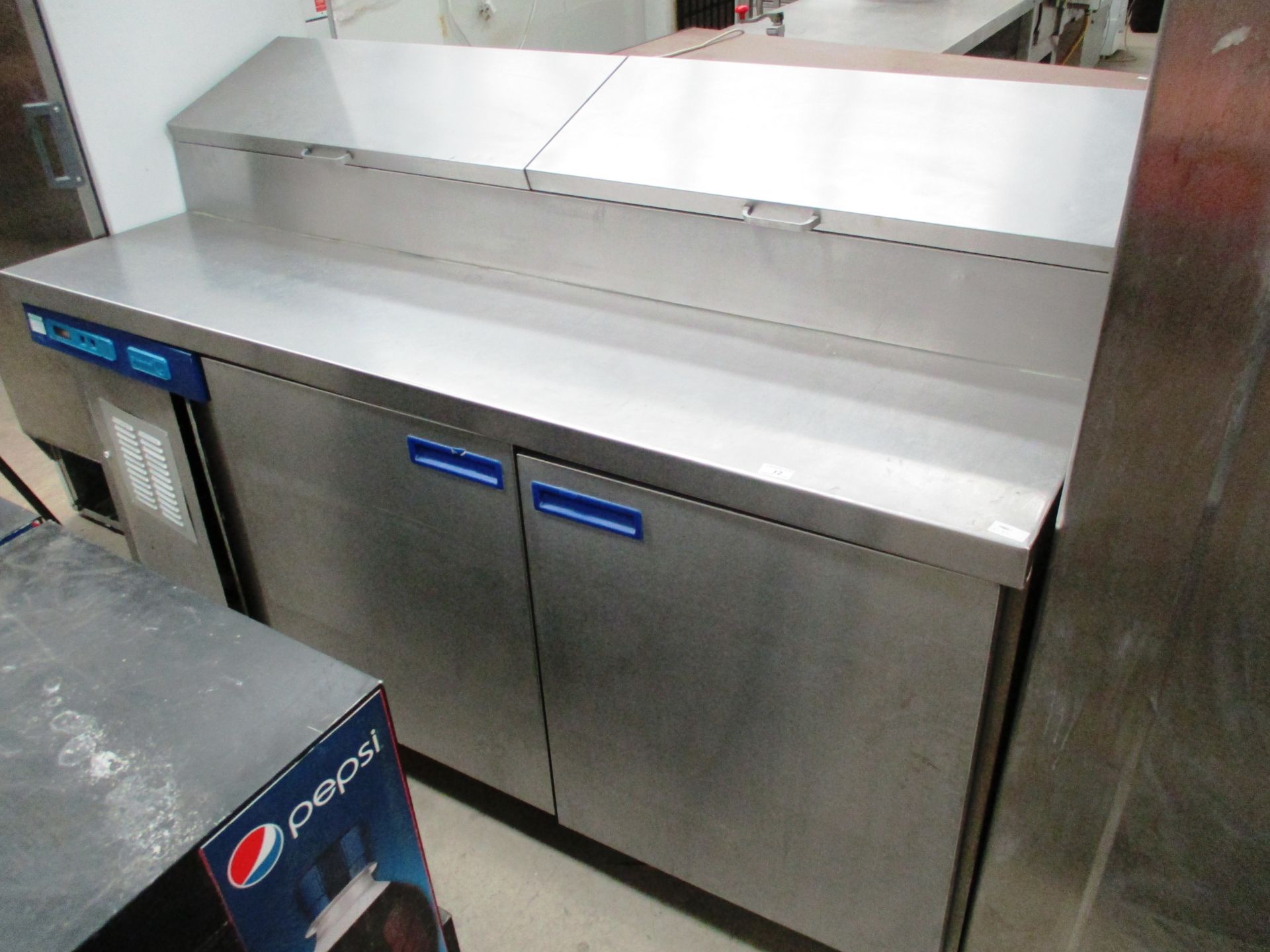 A Silverwing stainless steel double door chiller with preparation top 180cm long