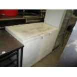 A white chest freezer 120cm long (please note: broken handle)
