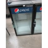 A Beverage Air single door glass front Pepsi bottle chiller