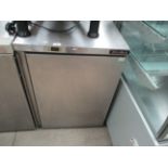 A Blizzard stainless steel under counter fridge