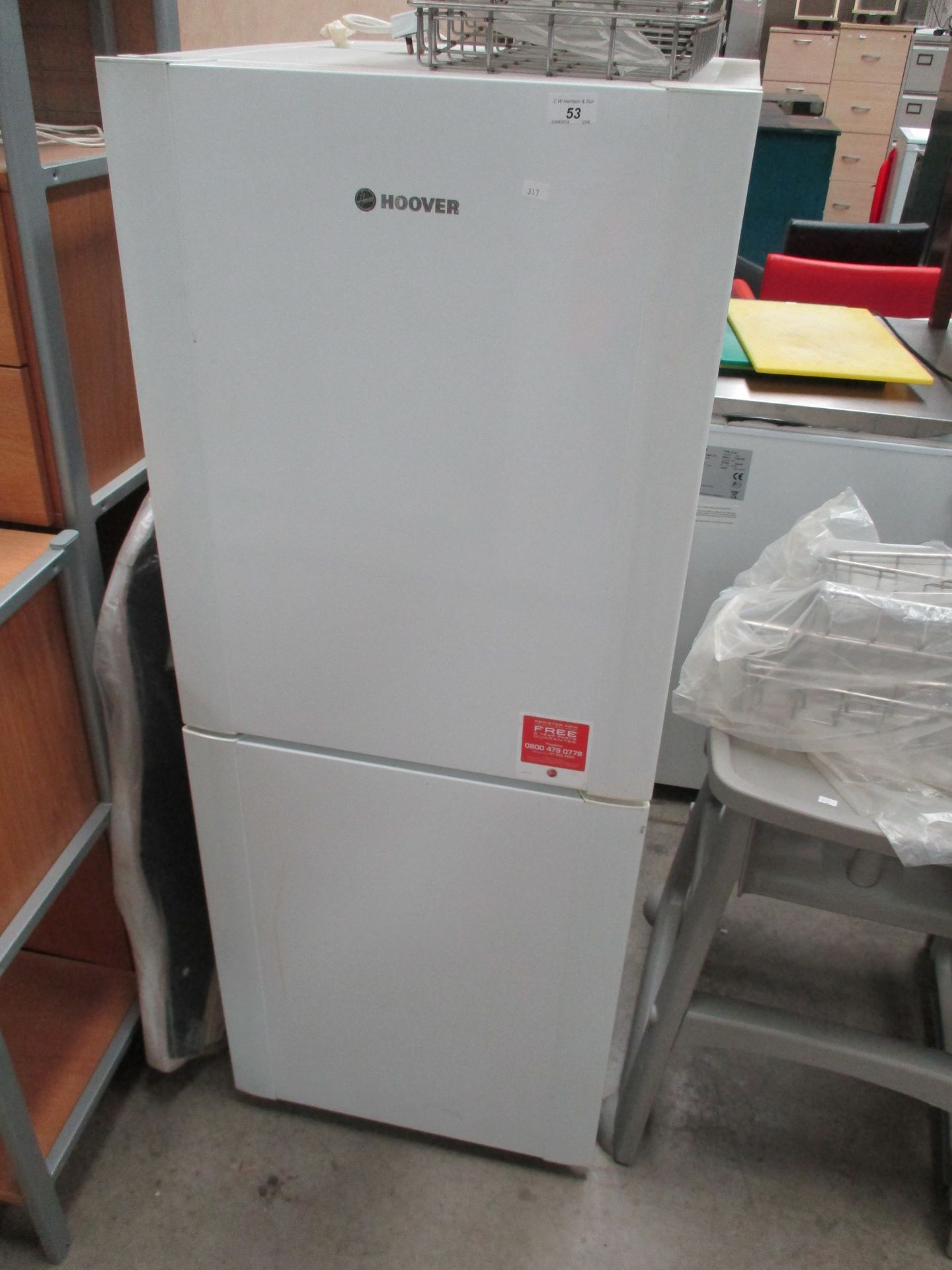 A Hoover white upright fridge/freezer