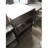 A stainless steel four shelf preparation table 64 x 70cm