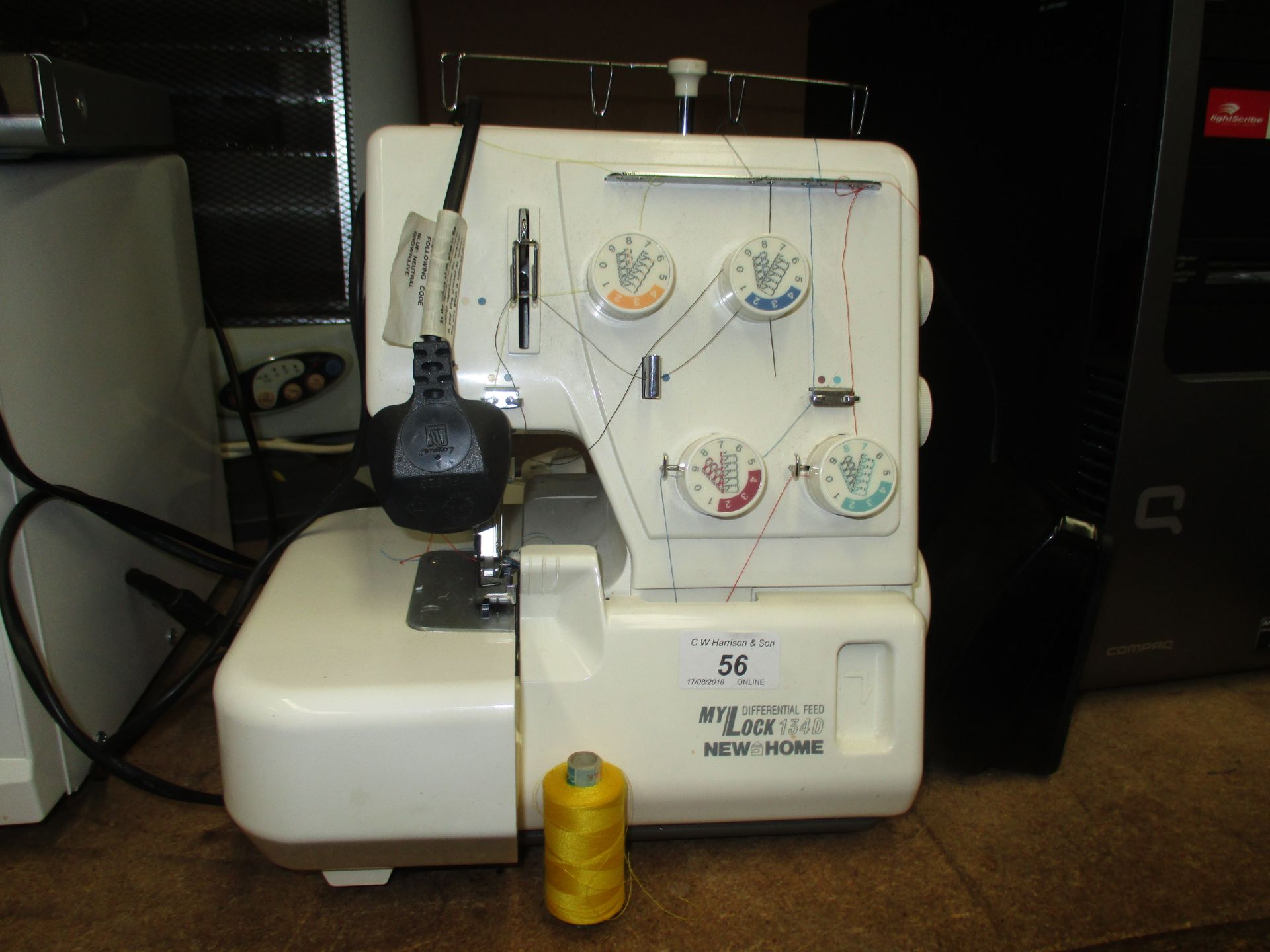 A New & Home My Lock 134D sewing machine with foot pedal