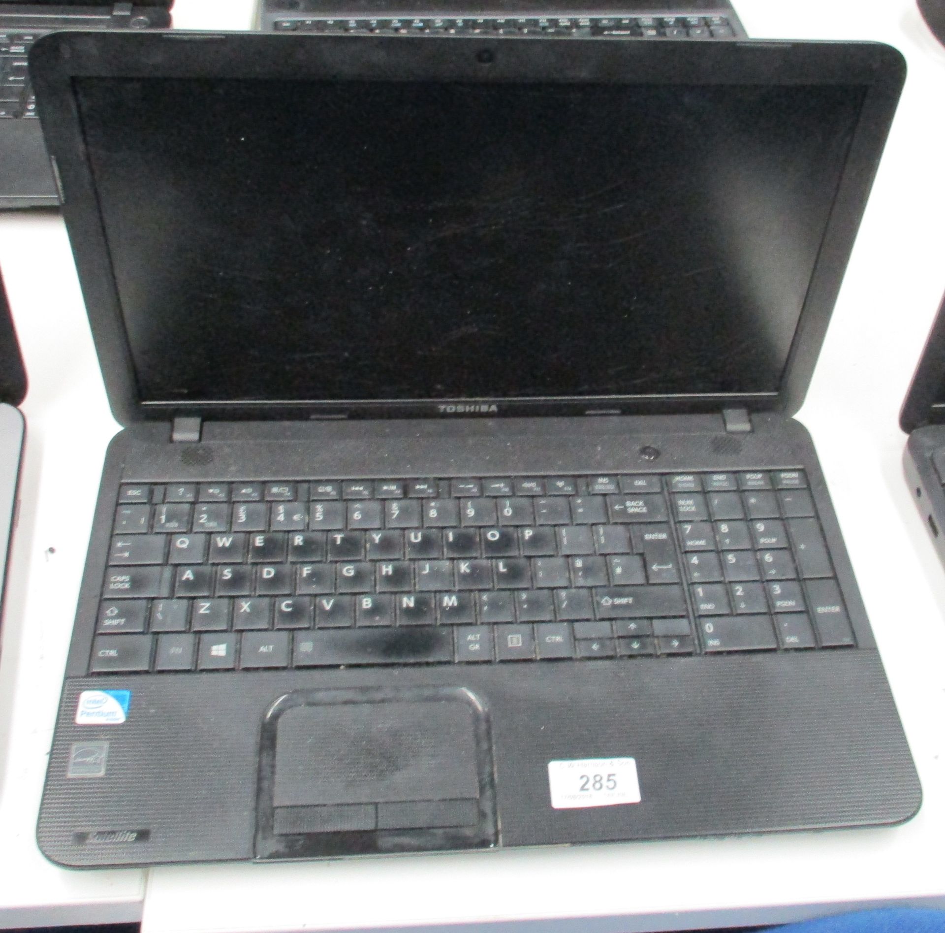A Toshiba Satellite C850 laptop computer - no power lead