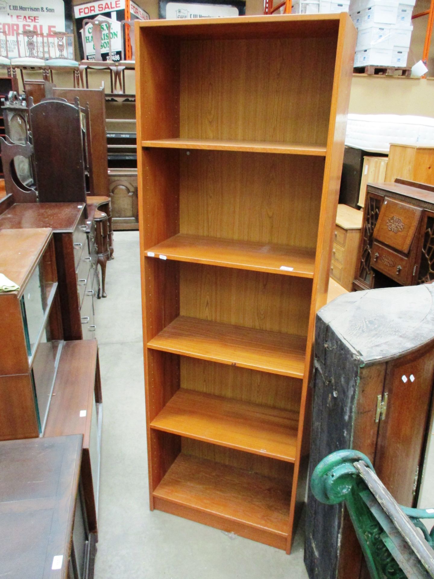 A teak five shelf bookcase 62 x 185cm