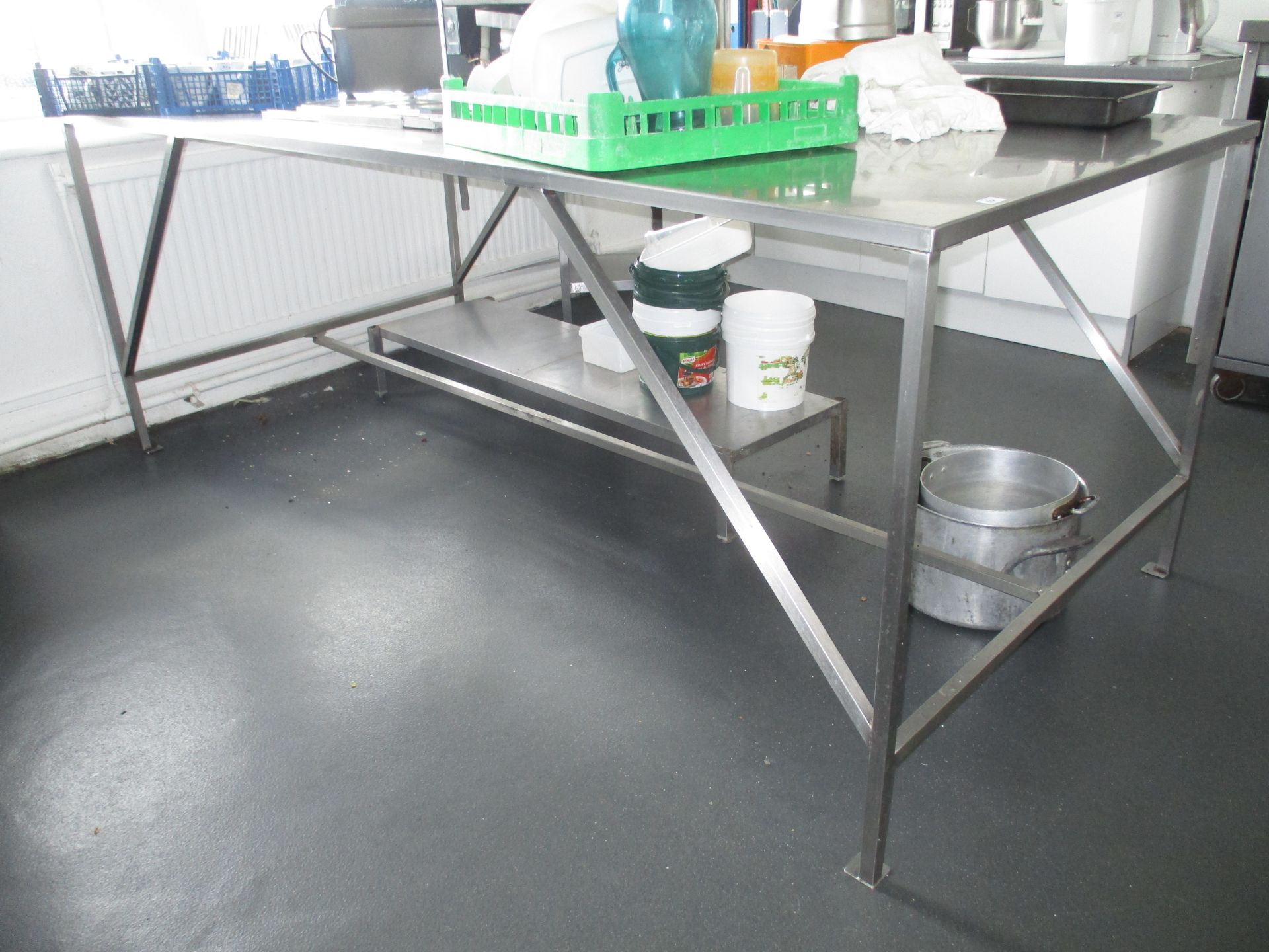 A large stainless steel preparation table,