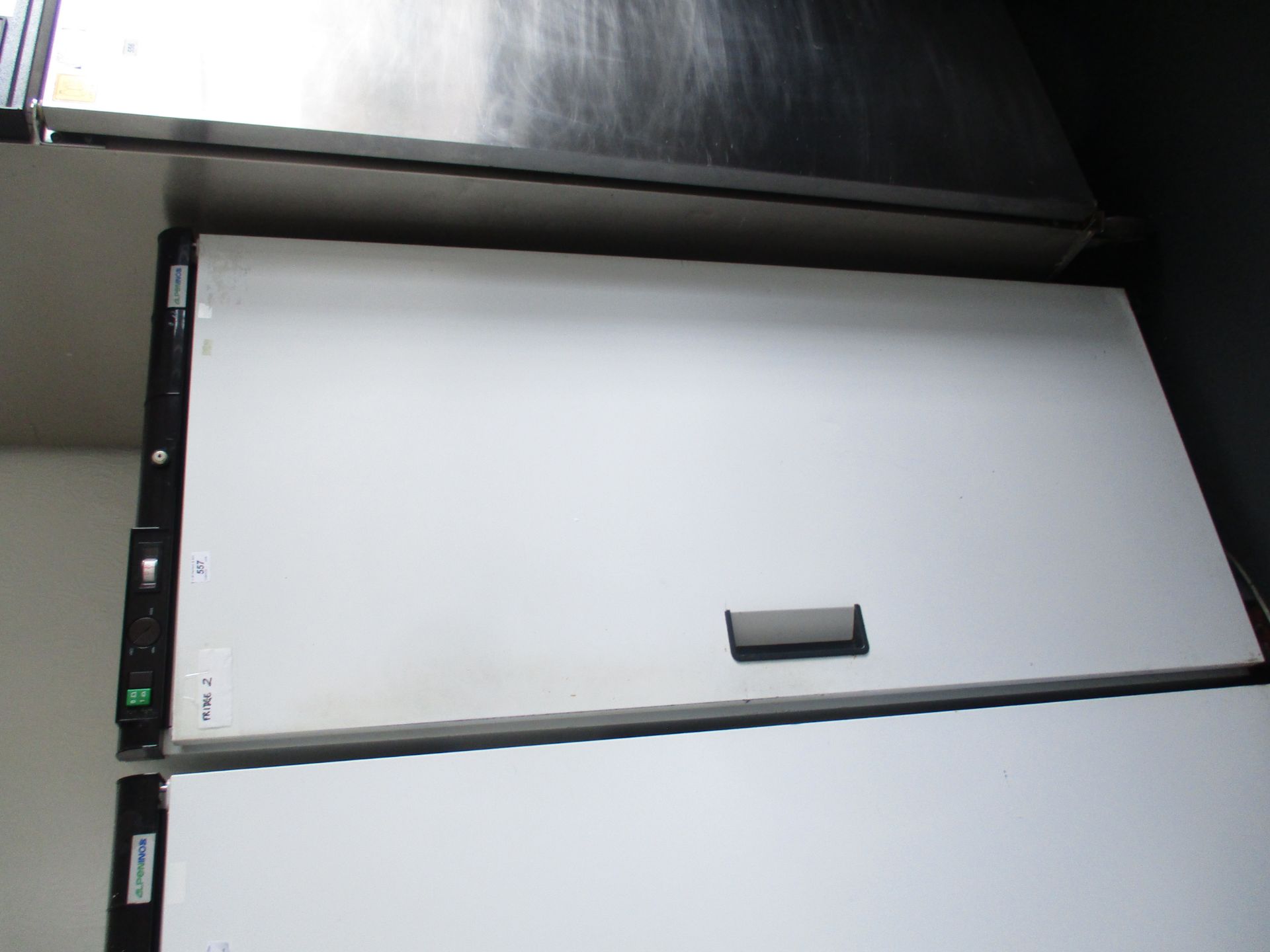 An Alpeninox 8 upright fridge,